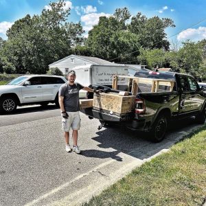 Veteran with a Greenworks Mower