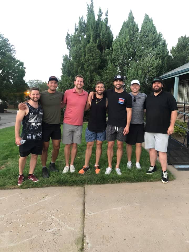 Bible study group volunteers performing yard work edging weeding and cleanup for homes around Aurora Colorado coordinated through I Want To Mow Your Lawn